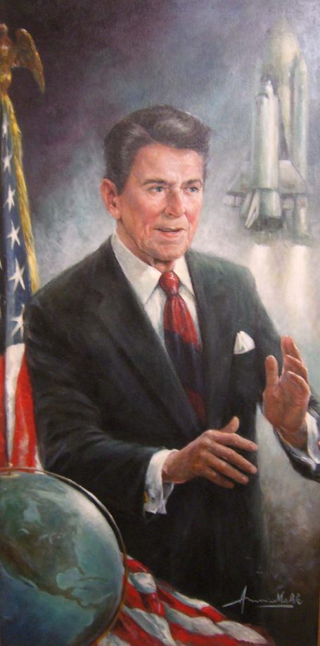 Americo and Eva working on a section of mural.